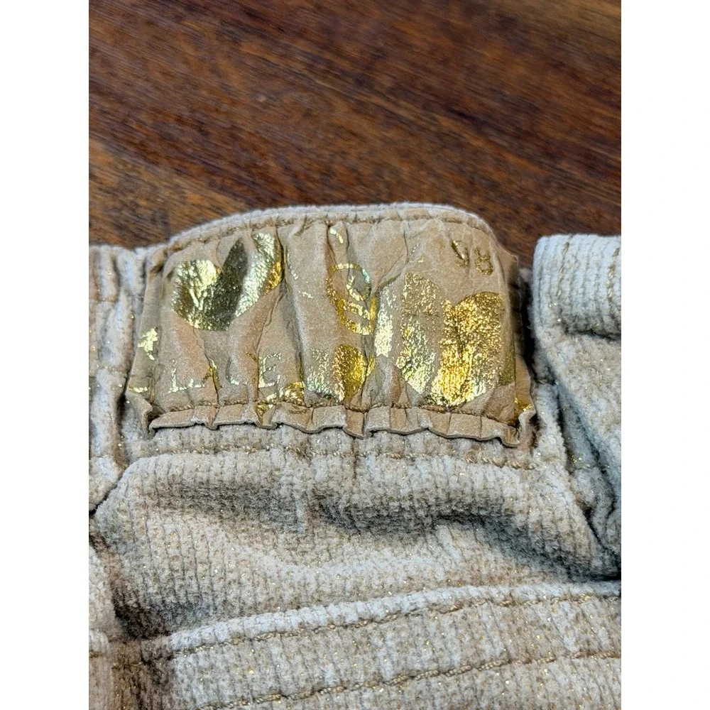 Vintage girls tan corduroy pants with glitter and heart pockets.  Sz 18 months.